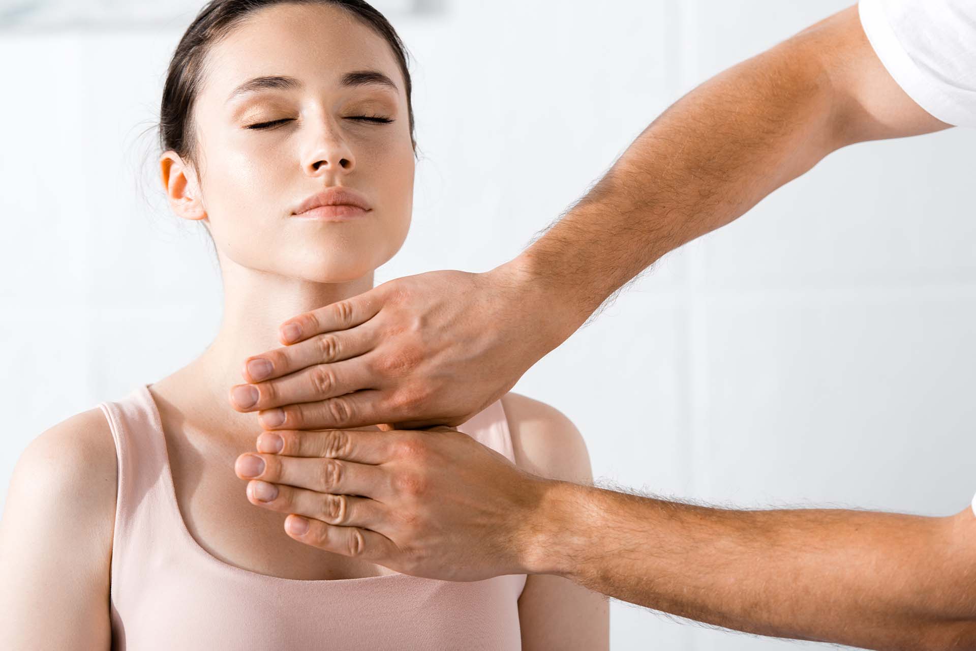 A therapist guiding a client through a body-centered therapeutic exercise, representing the principles of Integrative Body Psychotherapy