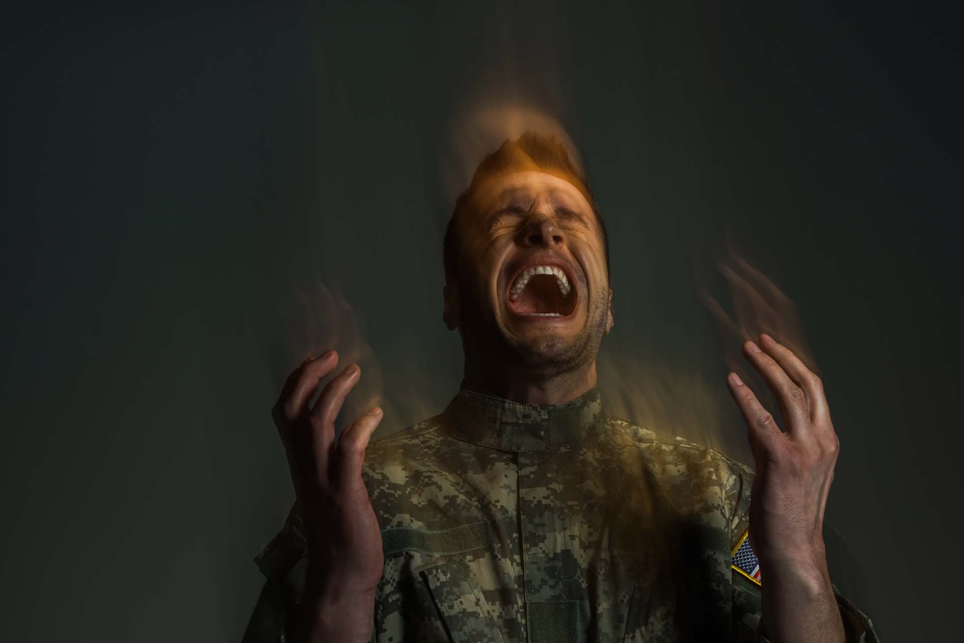A person visibly upset, symbolizing the sudden outbursts associated with Intermittent Explosive Disorder.