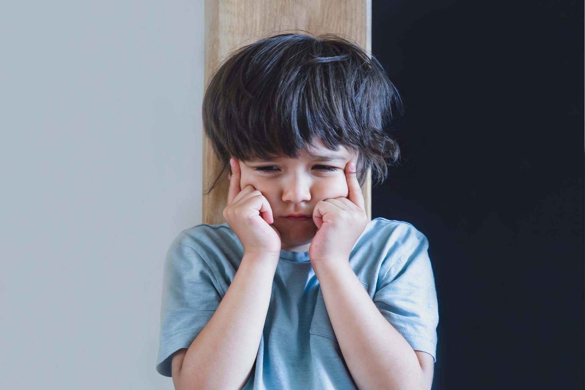 A person clenching their fists in frustration, symbolizing the struggle with impulse-control disorders.
