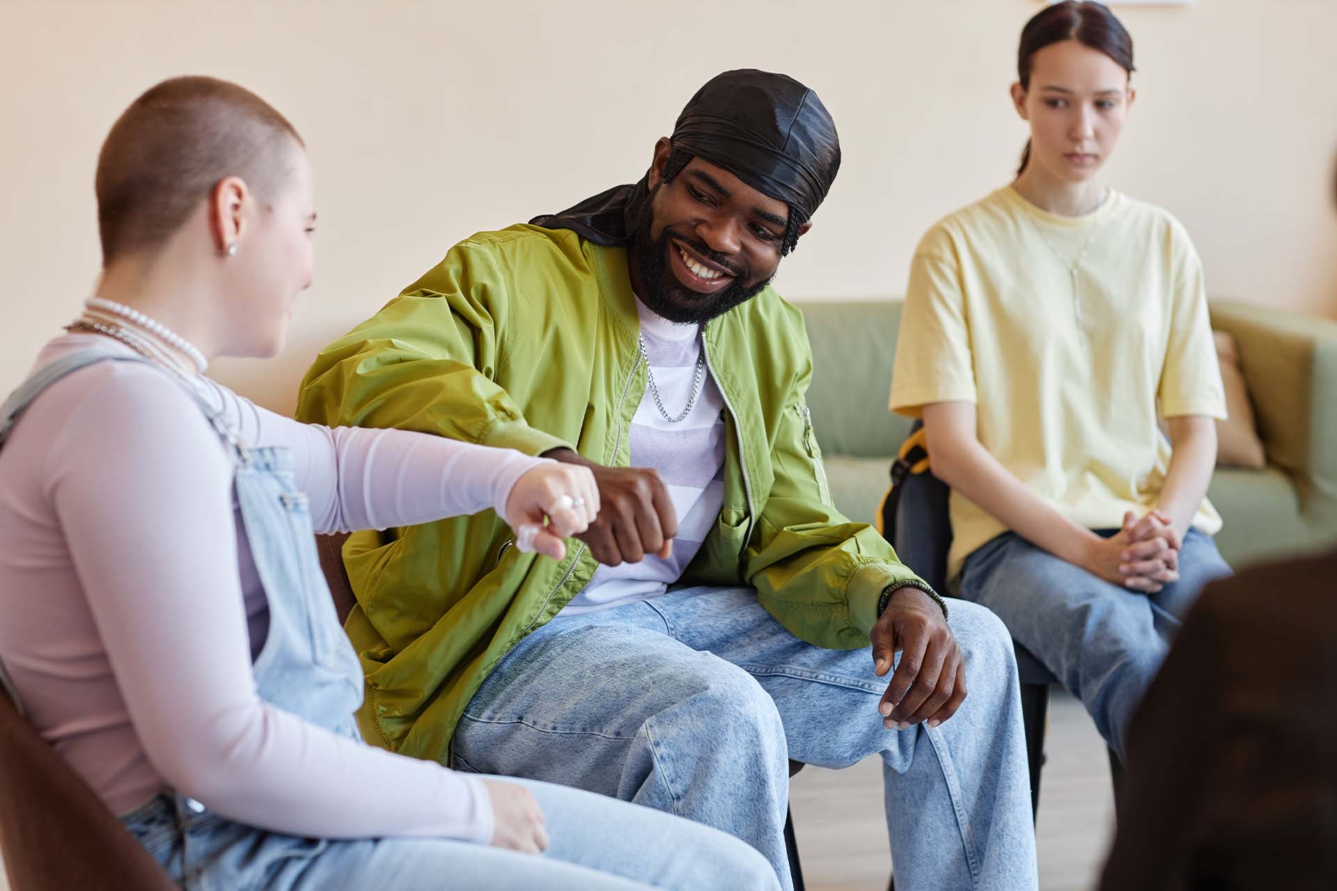 A close-up of hands breaking a chain, symbolizing recovery and freedom from substance abuse through therapeutic intervention
