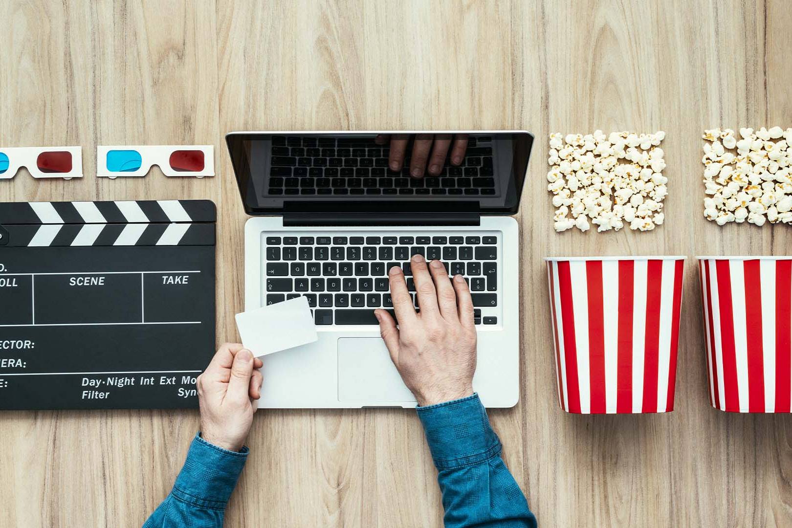 Online therapy for entertainment professionals in Los Angeles — laptop with film gear, popcorn, and clapperboard symbolizing mental health support for creatives.