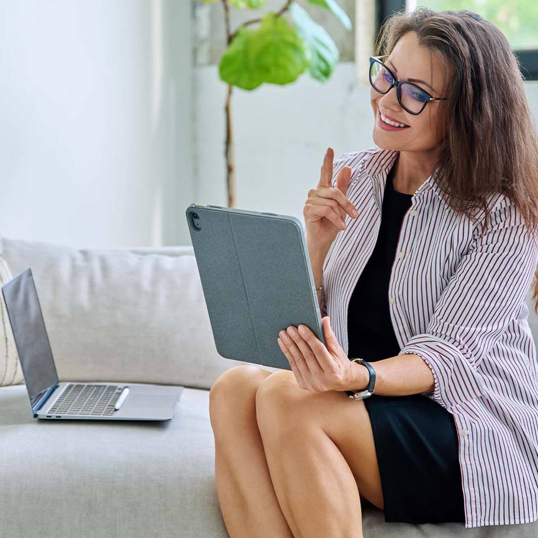 Professional CEO engaging in discrete online therapy session from private home office representing importance of confidentiality for executive mental health