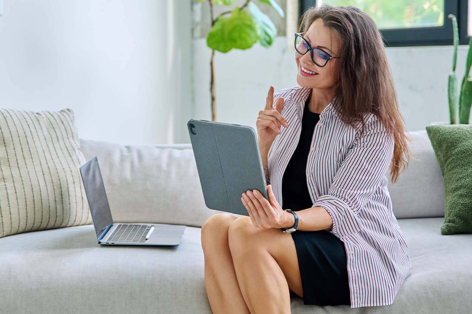 Professional CEO engaging in discrete online therapy session from private home office representing importance of confidentiality for executive mental health