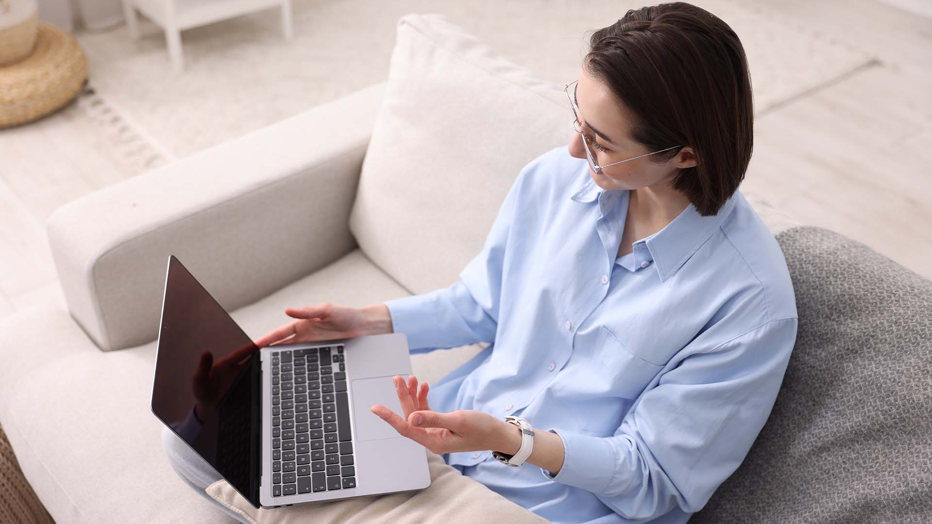 Isolated CEO engaging in online therapy session from home representing leadership loneliness and need for confidential support