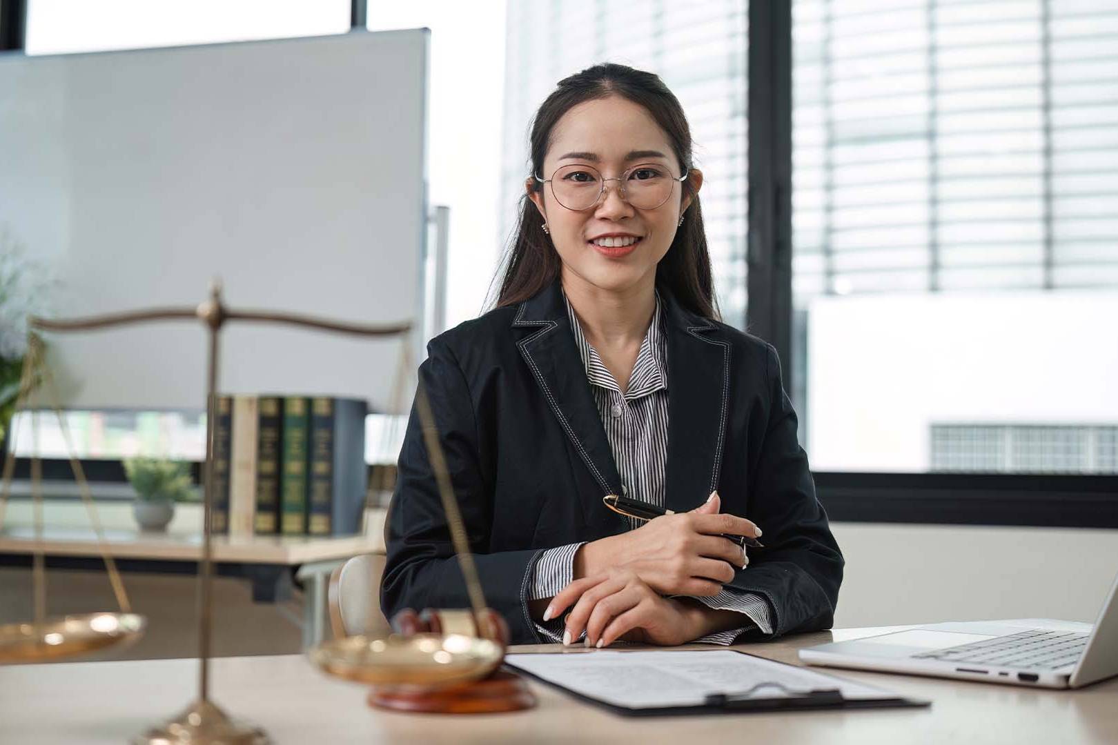 Professional female attorney in a legal office setting representing securities litigation stress management.