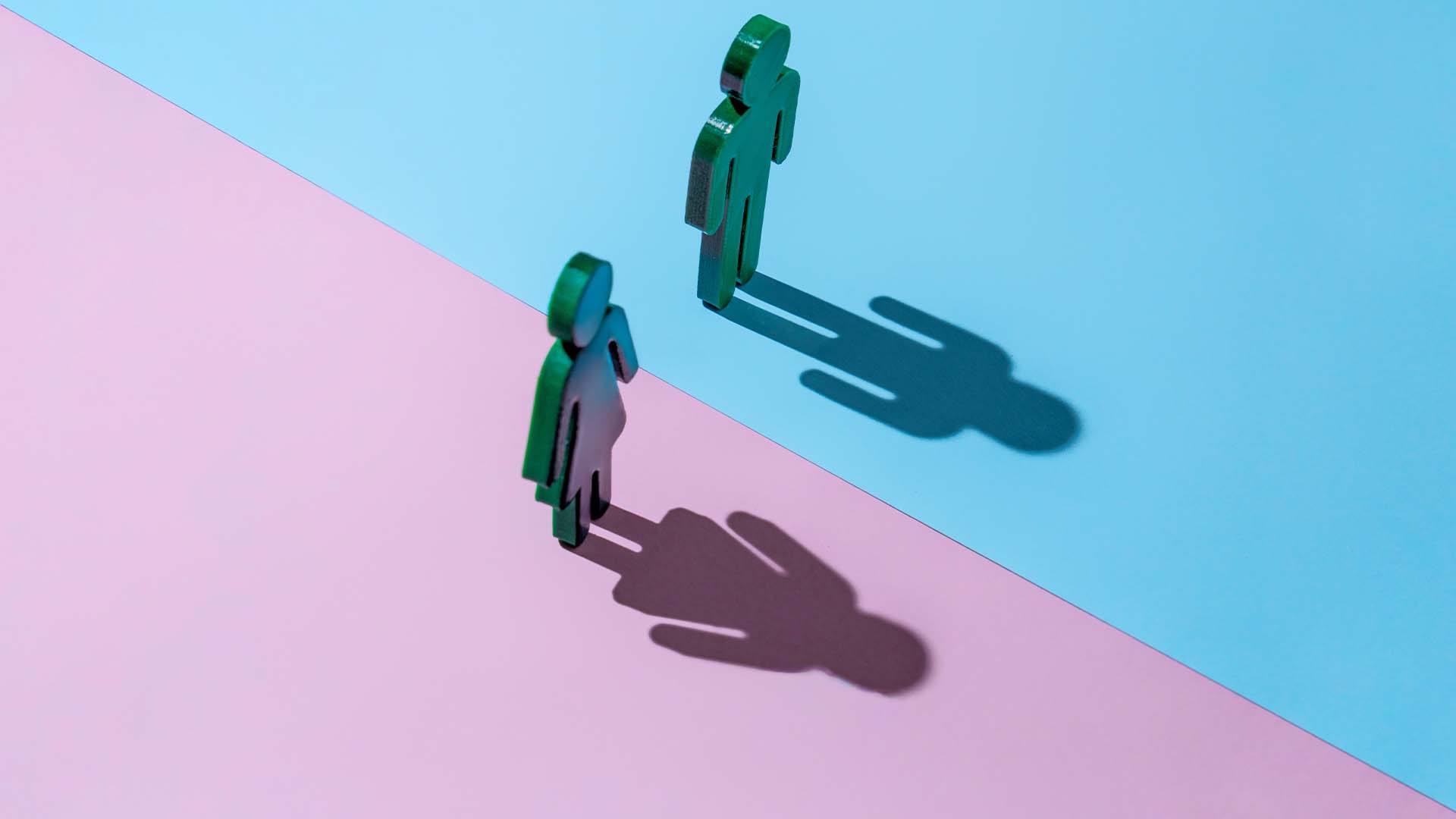 A professional couple experiencing emotional distance, representing relationship conflict and attachment issues in high-achieving adults.