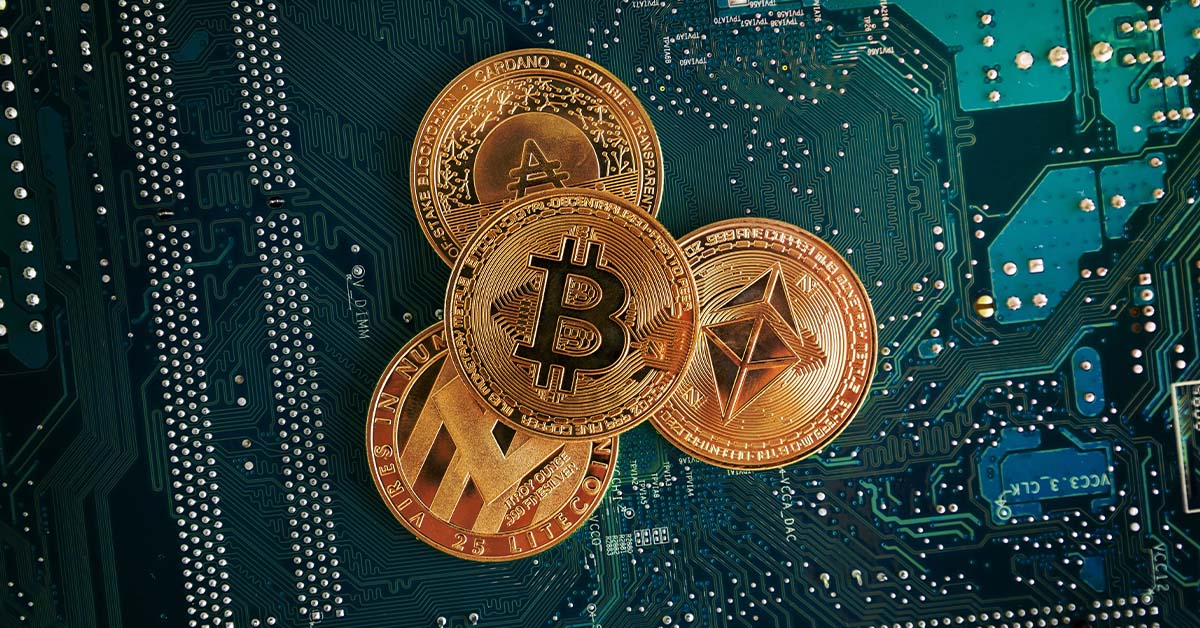 Physical gold cryptocurrency coins including Bitcoin and Ethereum resting on a green computer circuit board, featured image for the article Therapy for Crypto and Blockchain Founders.