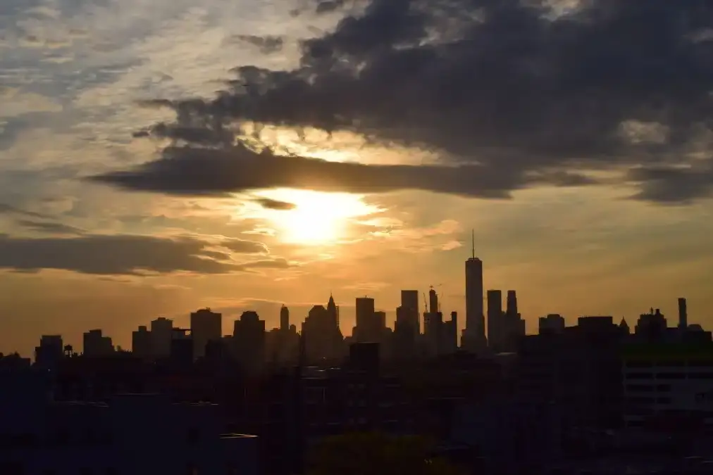 A New York City executive sitting alone in a quiet office, reflecting during a confidential therapy session.